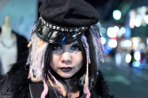 Memetan and C on the street in Harajuku at night. Memetan is wearing a handmade cyber wig with a fau