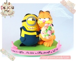 benkling:  benkling:  This company made a cake sculpture of a Minion marrying Garfield, and they put eyeliner on Garfield, ostensibly to protect the sanctity of straight marriage.  I posted this yesterday and gay marriage was legalized today.