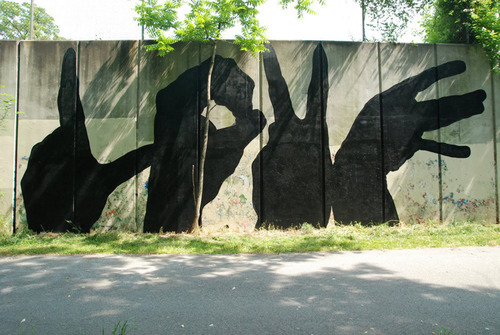 Love is in the shadows (street art)