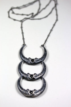 nomorechristmascash:  BloodMilk new moon. triple owl talon crescent necklace. €182,44 