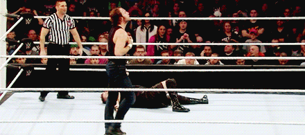 gauna-03:   Dean Ambrose goes into lunatic shirtless mode. 