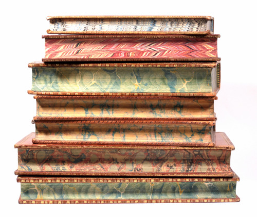 relentlesspasserby:updownbindery:michaelmoonsbookshop:19th century leather bound books with marbled 