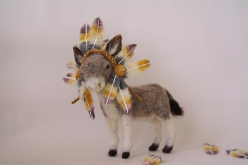 Donkey and feather head piece