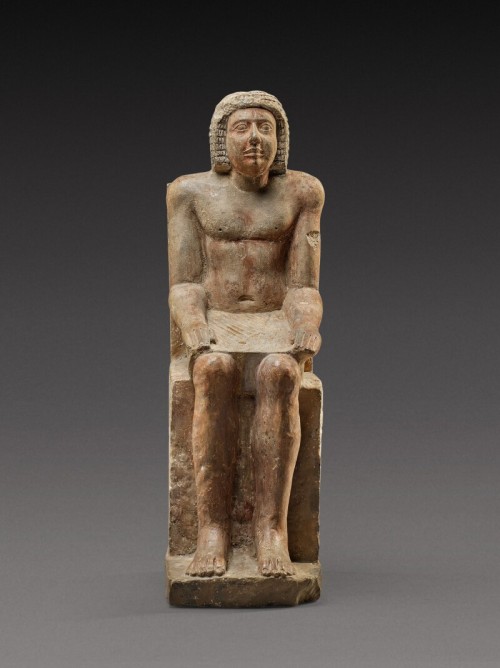 An Egyptian Polychrome Limestone Figure of Hem-Min6th Dynasty, 2360-2195 B.C.Inscribed “Treasu