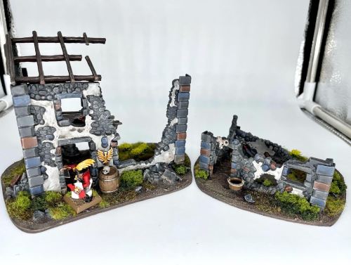 Some cute little ruins from Warlord Games, dolled up with some old school Warhammer Empire bits.