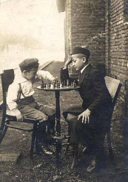 Hasidic boys playing chess in Łowicz, Poland, 1919. (YIVO)