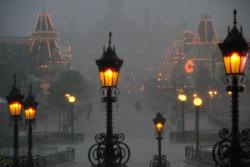 lanaismyevilqueen:   Disneyland during rain, or fog, or darkness is my favorite, it truly looks like a hazy dream.  This has to be the most beautiful thing I’ve ever seen