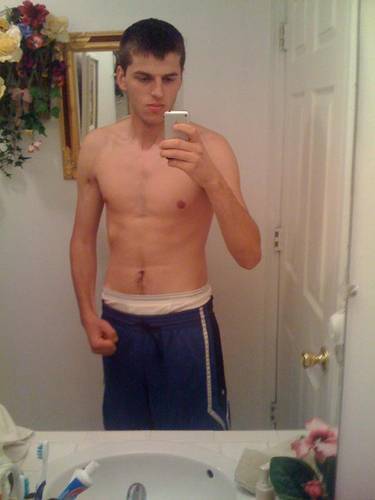 undie-fan-99:  Guy showing off in (what appears to be) his white Hanes boxerbriefs.