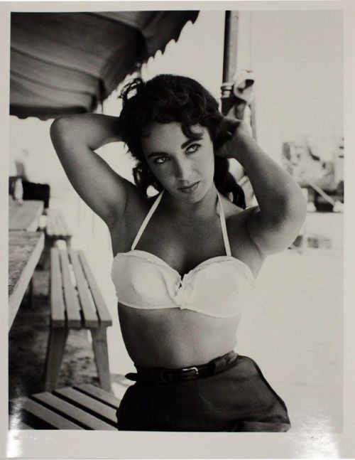 theniftyfifties: Elizabeth Taylor on the set of ‘Giant’, 1955. Photo by Frank Worth. 