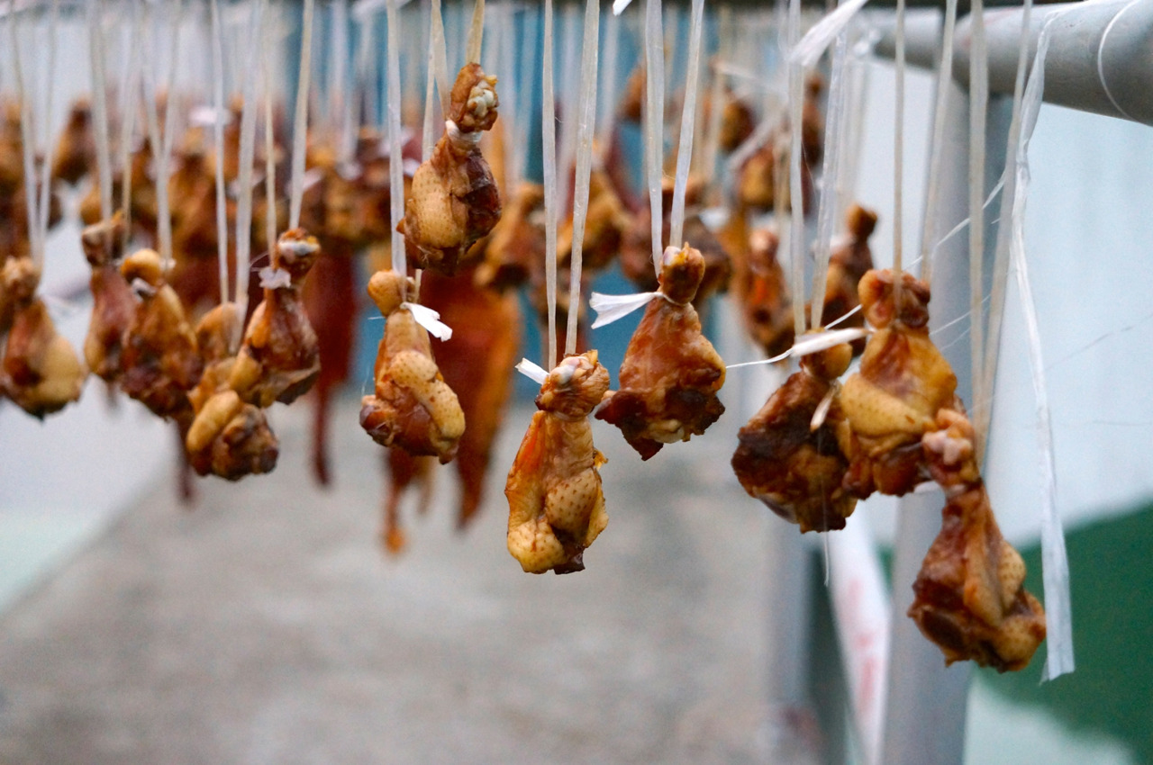 Duck wings hanging to dry