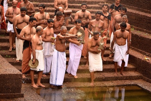 arjuna-vallabha:Goddess deity aaratuu (sacred bath) at temple pond, Kerala, photo by Rajesh Vengara