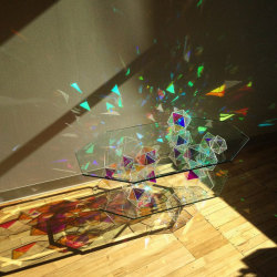 Sparkle Tables by John FosterA series of ‘reversed pyramid cut glass crystals’ which split the natural light into hundreds of rainbow reflections.