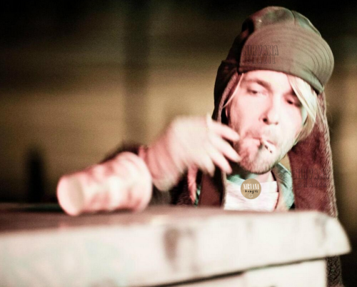 n-irvana:  Very rare picture of Kurt, probably, this photo was taken on July 22, 1993, the clothing is the same as the pictures made with Jesse F. sorry for the watermark