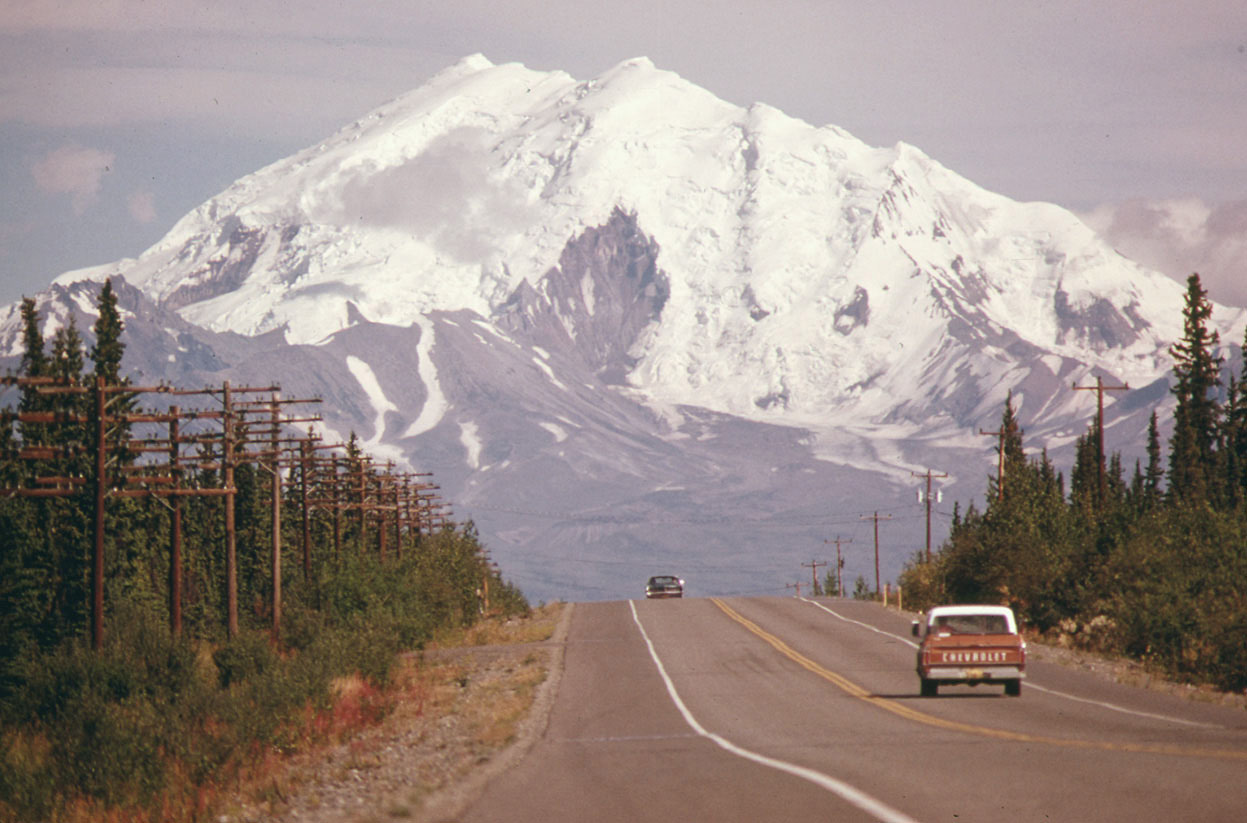 From America in the 1970s: The Pacific Northwest, one of 30 photos. Part 5 of Documerica Week on In Focus. Looking east along Alaska’s Glen Highway, toward Mount Drum (Elevation 12,002 Feet) at the intersection of the highway and the...