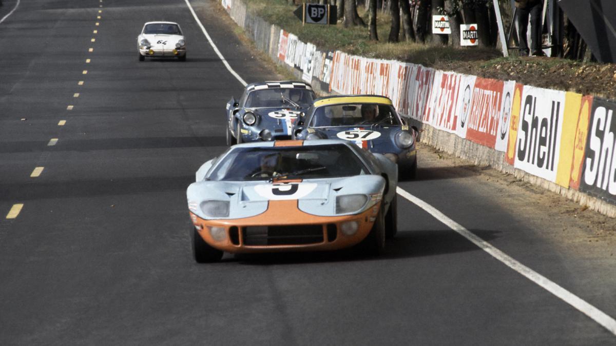 legendsofracing:  The Ford GT40 of Pedro Rodríguez and Lucien Bianchi storms down