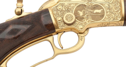 John Ulrich engraved and gold plated Marlin M1897 Exhibition model lever action rifle.from Cowan’s A