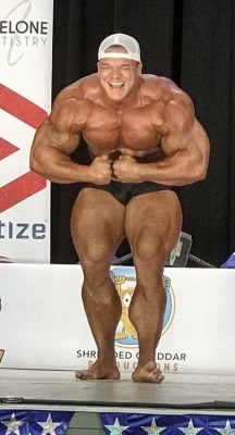 Dallas McCarver - Guest posing at the NPC Brew City at 330lbs.