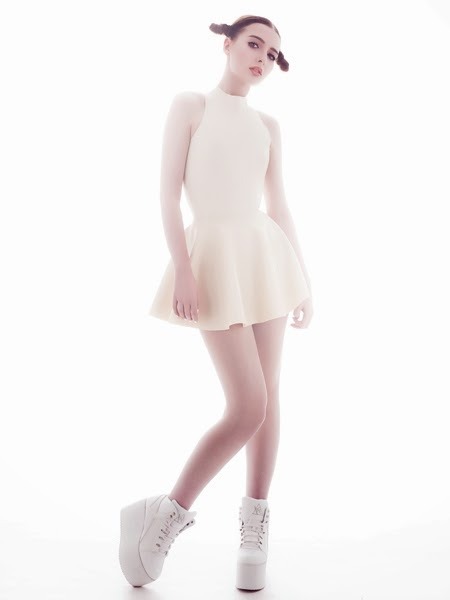 latexfashion:  Sohui in Lady Lucie latex. White, so white. 