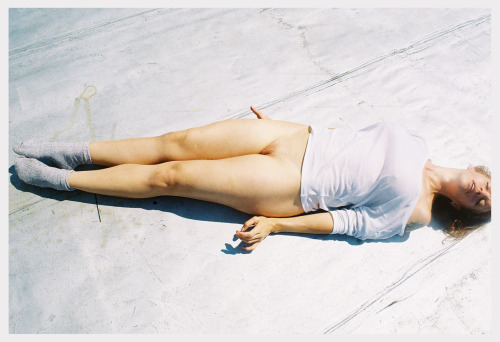 Self-portrait with 90 degree rooftop, wool socks & equatorially-diverse trees. spring 2014, film