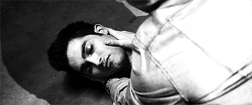 youneedmetosurvive:Stiles holding hands with Derek, caressing his face and touching his bare back