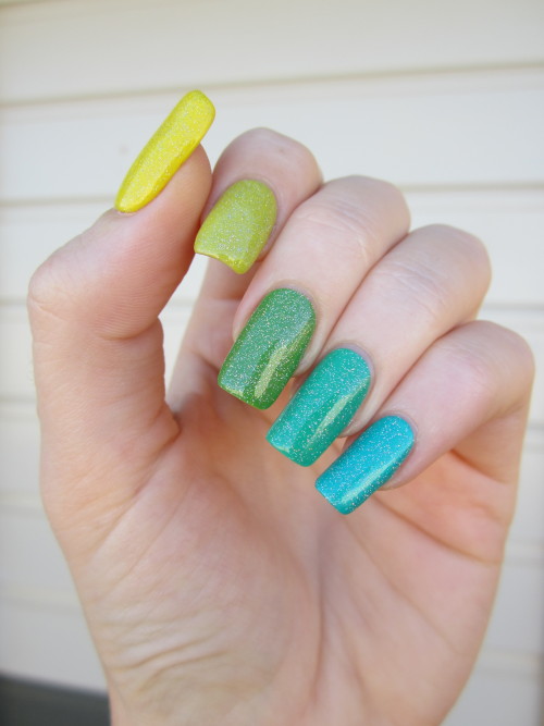 Green ombre nails. More original nail art.