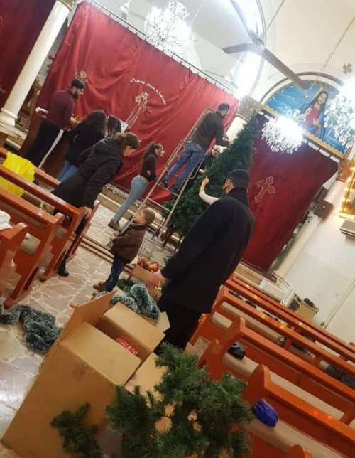 Getting the church ready for Christmas in Qamishli, Syria.