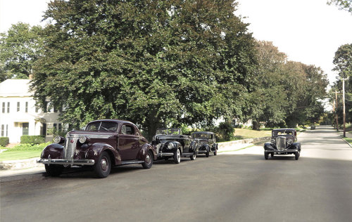 photojojo:  Michael Paul Smith builds 1/24 scale replicas of retro scenes and cleverly photographs them against backdrops in his neighborhood. The result is incredibly convincing scenes of early 19th century cars rolling down suburban streets. Some of