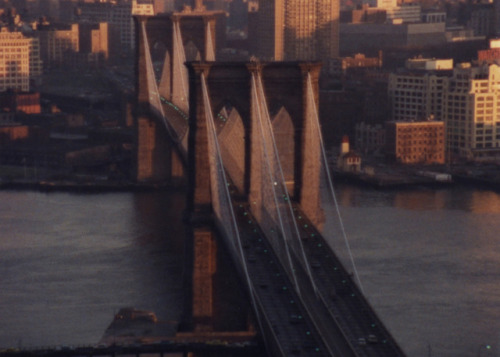 In this still from Ken Burns’s 1981 film Brooklyn Bridge, a dark, beautiful glow outlines the city a