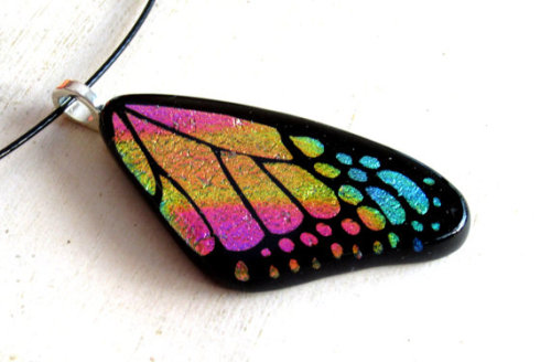 Front and rear fused glass butterfly wings I created using a rainbow mixed dichroic glass.  All