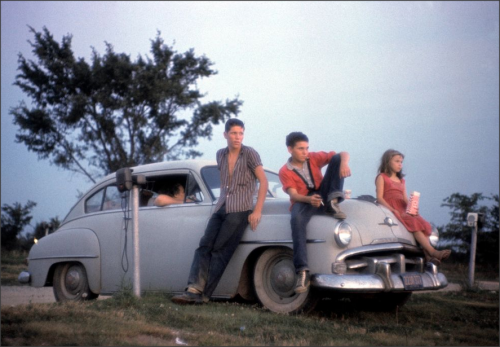 Family watching a movie at a drive in theater betweenFlora and Louisville Illinois, 1960Photo: Wayne