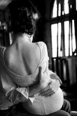 steinerkd:  He holds her tight to assure her, to calm her and make her feel safe. The soft fabric of her beautiful luxurious dress smooth under his fingers and the discrete lace patterning inspiring his fingers to travel and explore. Her weight on his