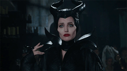 cookienun:  pinchyboy:  wolf-cub:  slay me with those cheekbones   “Angelina Jolie worked very closely with the costume and make-up designers to develop Maleficent’s menacing look. Disney executives objected, hoping to take advantage of Jolie’s