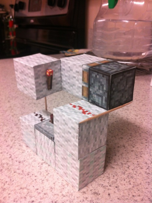 papercrafts-and-stuff:  T-Flip Flop A redstone logic gate. Basically, it makes a button act like a lever. 
