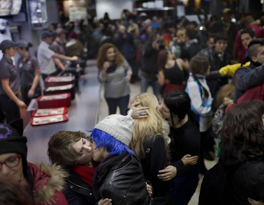 micdotcom:  LGBT protesters respond to homophobic Burger King with massive kiss-in