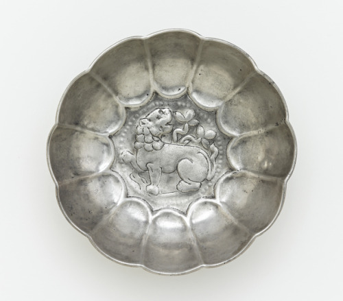 Silver bowl with lion, foliage, and a ring of raised dots. Central Asia, late 6th-early 7th c. A.D. 