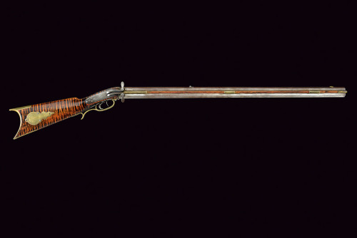 Rare over and under sidehammer percussion double barrel long rifle, mid 19th century.