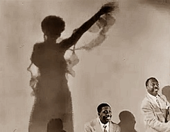 theladybadass:  &ldquo;Minnie&rdquo; shadow dancing during Cab Calloway and his Orchestra’s performance of Minnie Moocher. The scene is from 1955 concert film Rhythm and Blues Revue. 