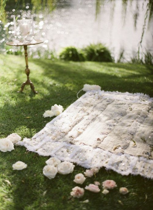 Moroccan blanket ceremony decor Photography: Gia Canali - giacanali.com