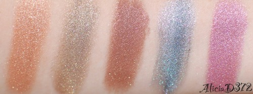 Loose Eyeshadow swatches L to R: Apocalyptic, Nitro, Muck, Tombstone and DollfaceMazzie Cosmeticsveg