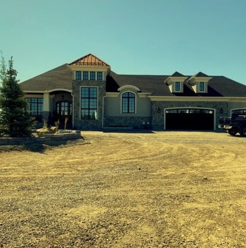 Front Yard - Concrete Pavers Inspiration For A Sizable Traditional Front Yard With Metal Fencing And