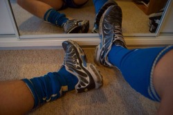 Men in rugby and footy socks