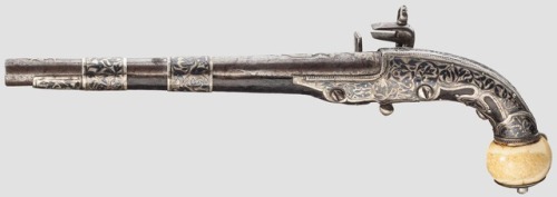 Silver niello and ivory miquelet pistol from the Caucuses, circa 1850.from Hermann Historica