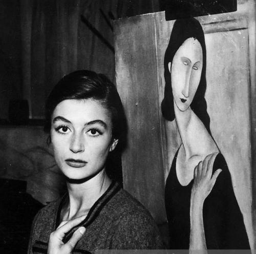 Anouk  Aimee  with a modigliani painting, 1957.