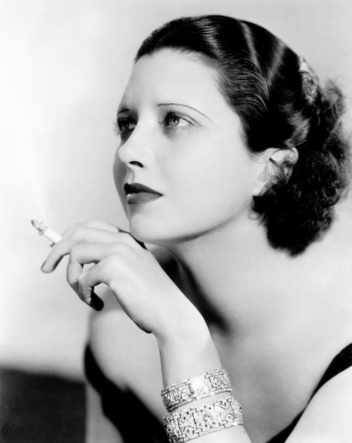 wehadfacesthen: Kay Francis, c.1934, showing off some pricey diamond bracelets