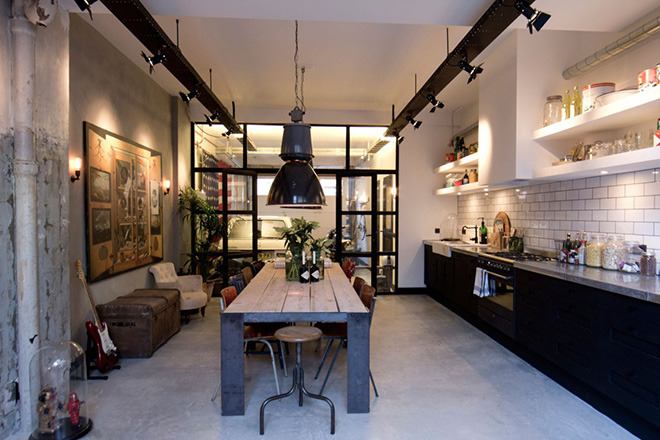 carlosison:  bobbycaputo:  An Old Amsterdam Garage Converted Into An Apartment Amsterdam-based