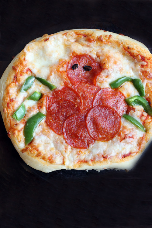 Porn craving-nomz:  Mini Halloween Pizzas  photos