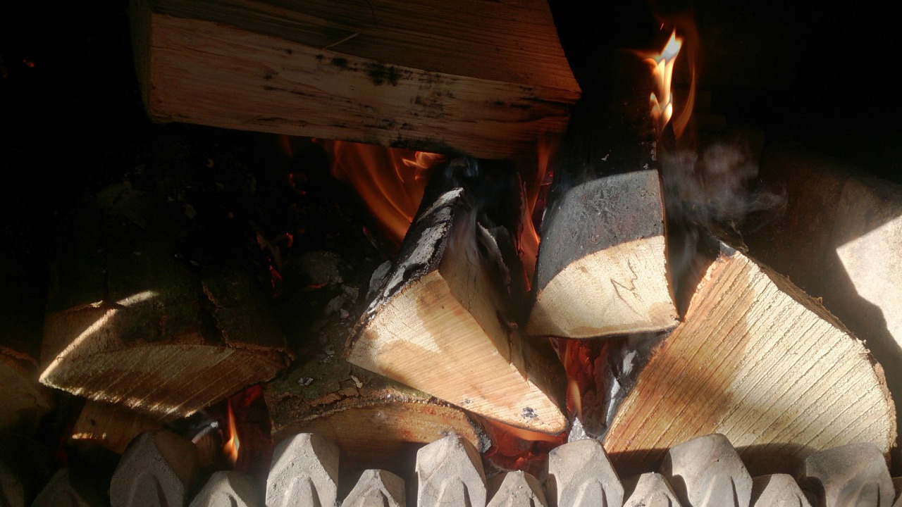 Sun is shining. House is freezing. Logs are frozen.