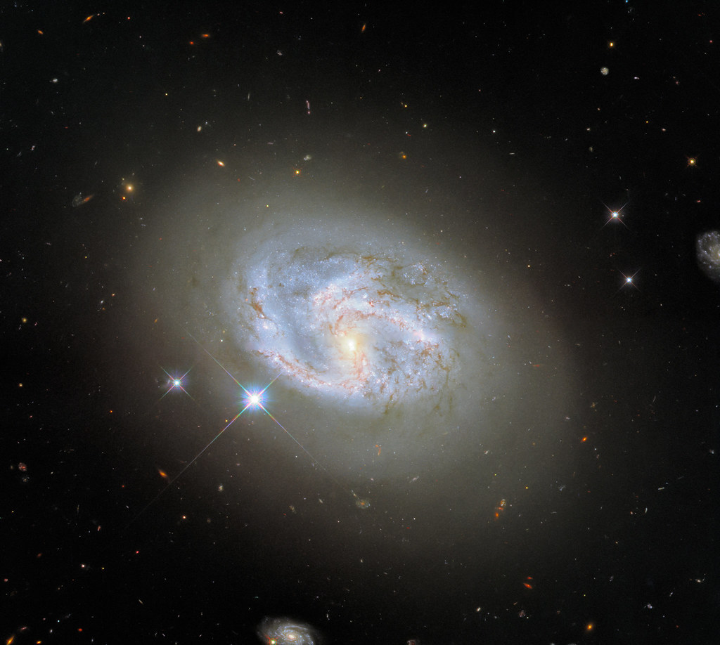 Hubble Sees a Spiral in Good Company by NASA’s Marshall Space Flight Center