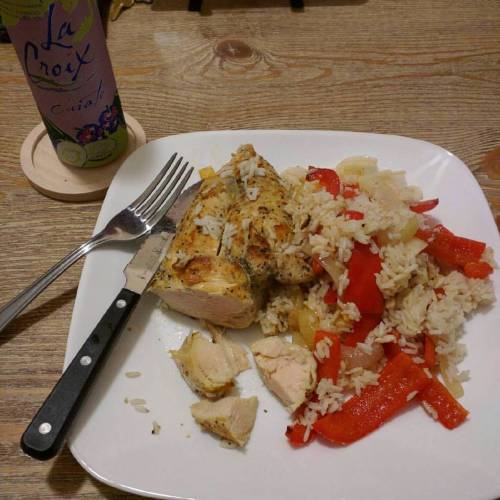 Lemon pepper chicken with rice &amp; grilled/sautéed peppers and onions. Workout done. De