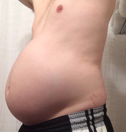 bellylover111:  So I obviously keep growing 😏  Im so stuffed and inflated… It hurts to move, I feel so huge and round! I decided to see how much i could eat tonight and then seeing and feeling the massive size of my giant gut decided ‘hey why not